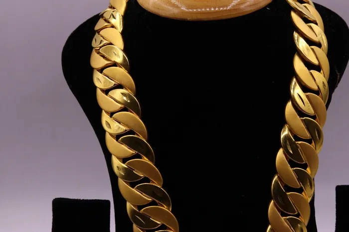 TRIBAL ORNAMENTS Necklaces Sale 22 karat yellow gold handmade chain heavy curb Cuban hollow unisex