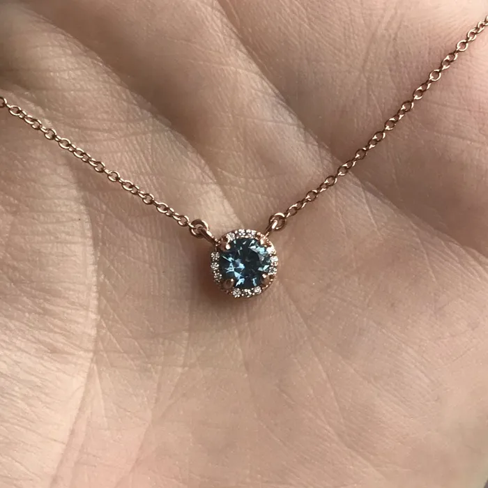 052ct Montana Sapphire and diamond halo necklace in 14k rose gold Anueva Jewelry Necklaces 052ct Montana Sapphire and diamond halo necklace in 14k rose gold Anueva Jewelry Necklaces