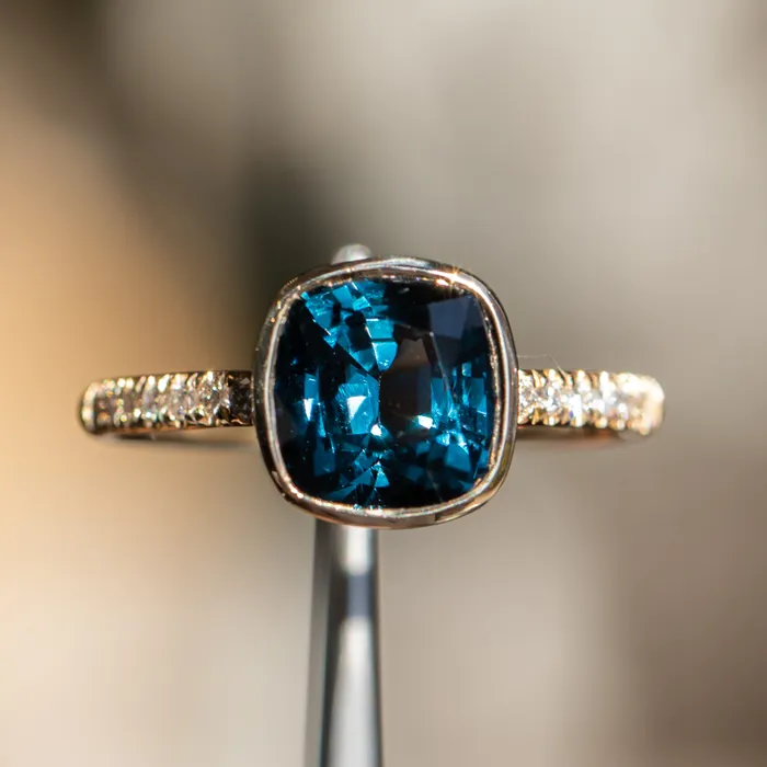 315ct Cushion Cut Spinel Low Profile Bezel Solitaire Ring with French Set Diamonds in 14k Yellow Gold Anueva Jewelry Rings