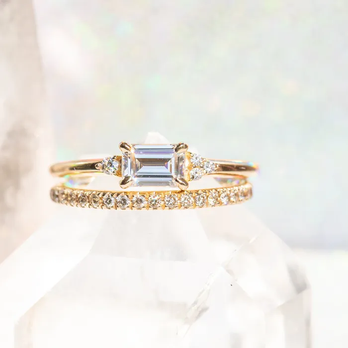 Rings Anueva Jewelry EastWest Emerald cut Moissanite Asymmetrical Ring in 14k Yellow Gold