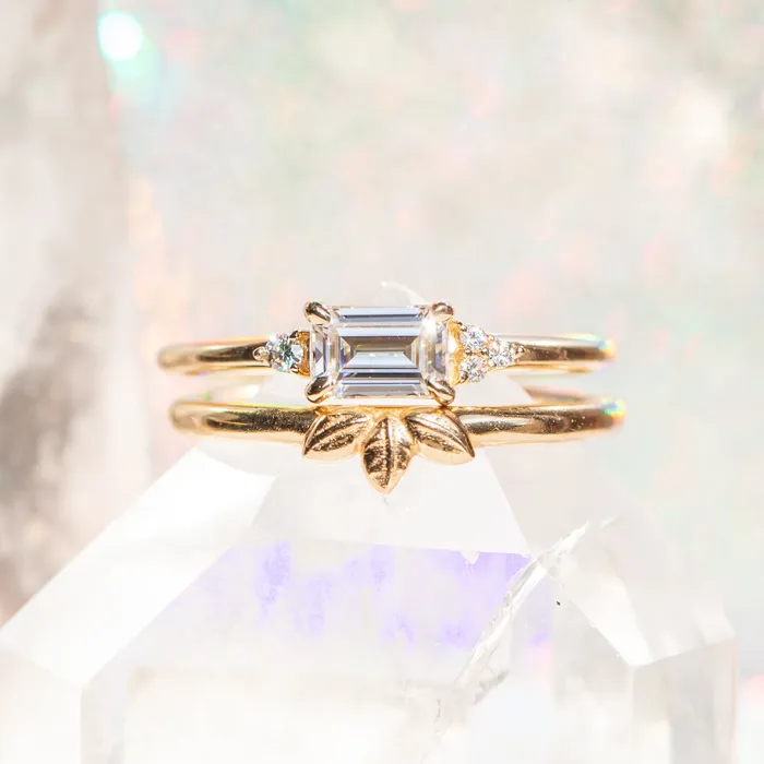 Rings Anueva Jewelry EastWest Emerald cut Moissanite Asymmetrical Ring in 14k Yellow Gold